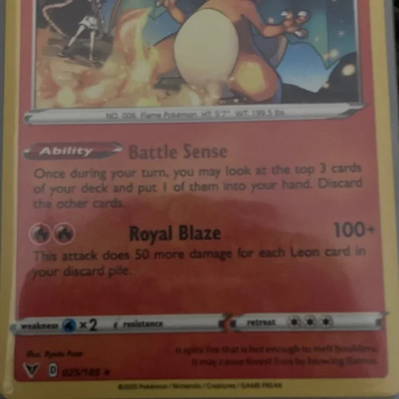 Pokemon Charizard Trading Card - Red and Yellow also has a sleeve - Picture 3 of 9